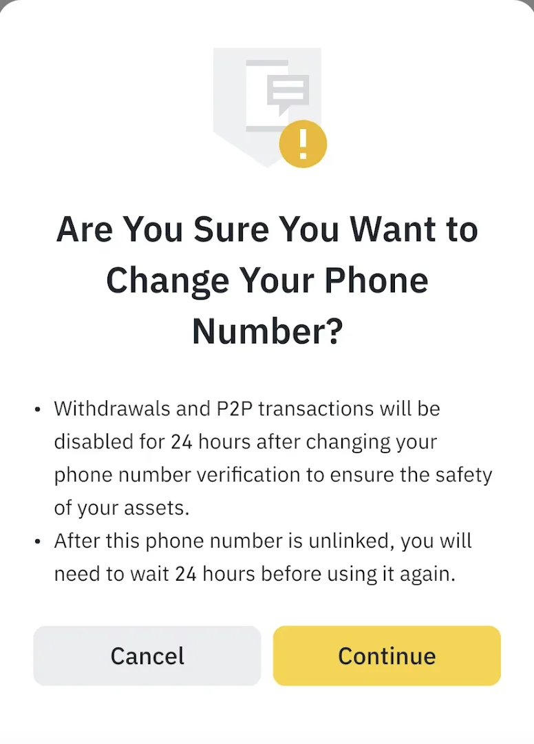 幣安 App 更改手機號碼前的英文確認視窗，寫提領與 P2P 交易停用 24 小時，並寫解除綁定後需等 24 小時才能再使用該號碼